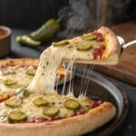 cheesy slice of homemade pickle pie pizza